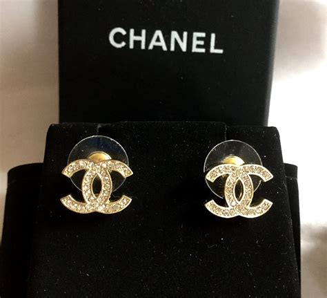 chanel logo stud earrings gold|Chanel cc logo earrings price.